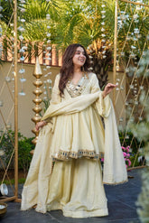Ivory luxury peplum style suit