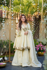 Ivory luxury peplum style suit